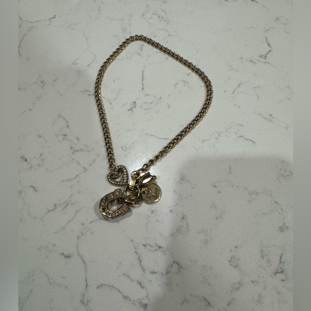 Juicy Couture Gold Charm choker necklace with Horseshoe and Luck Charms